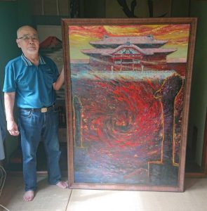 金城さんが首里城の再建を願って描いた油絵＝30日、平良の自宅